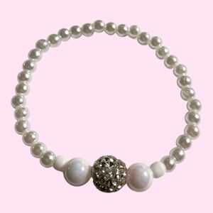 White bracelet with shiny rhinestone